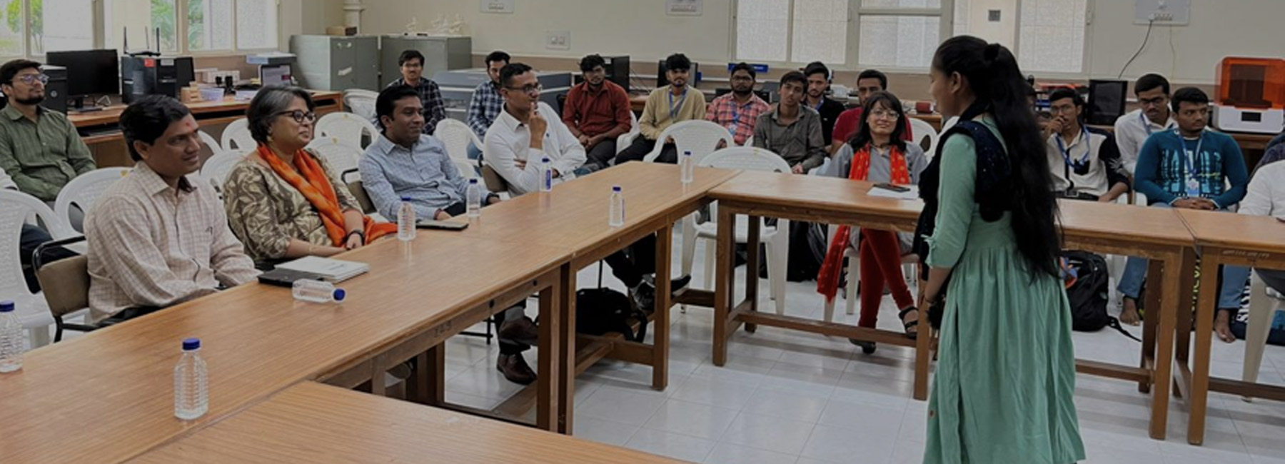 Representatives from SAP and Edunet Foundation interacting with a Code Unnati student